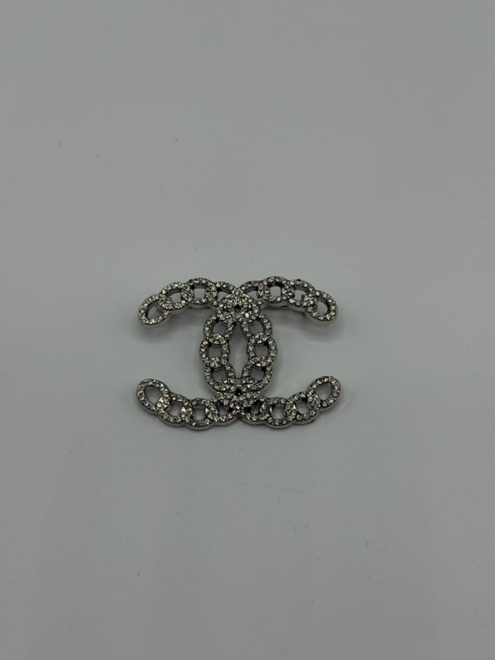 CHANEL Silver Crystal Interlocking CC Chain-Link Brooch